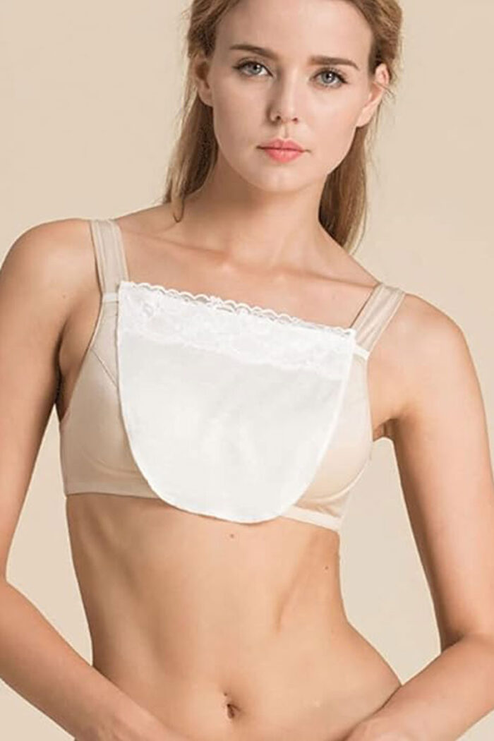 Model wearing white clip-on camisole cleavage cover with lace trim – Angelicez